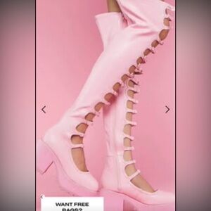 Dolls Kill sugar thrillz size 7 women’s pink full length boots. barely worn.